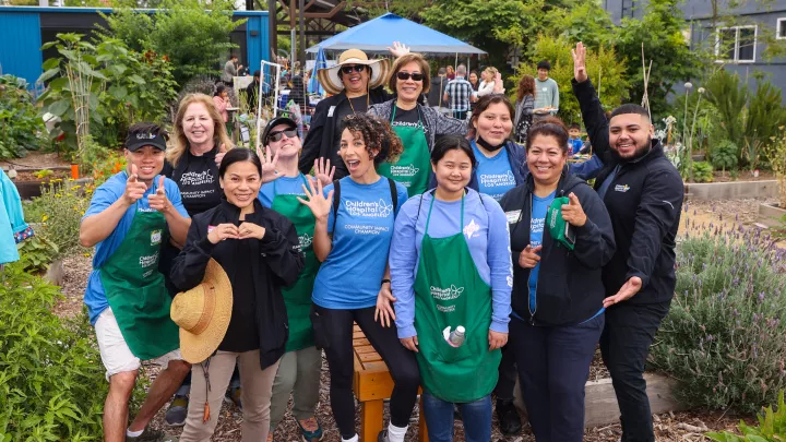 Members of the Community Affairs team and CHLA volunteers pose for a photo in the East Hollywood Community Garden