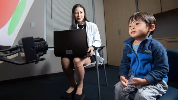 Dr. Melinda Chang measures the visual attention of a young child
