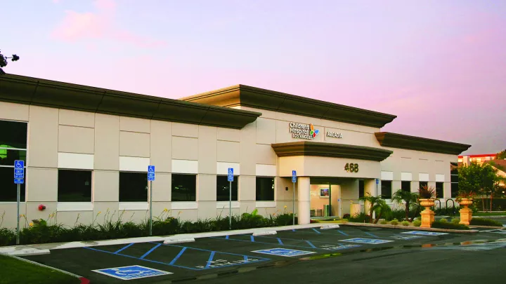 Photo of the Arcadia Urgent Care building at sunset.