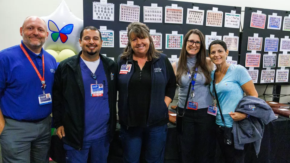 Five CHLA nurses and nurse leaders stand together and smile at the camera.