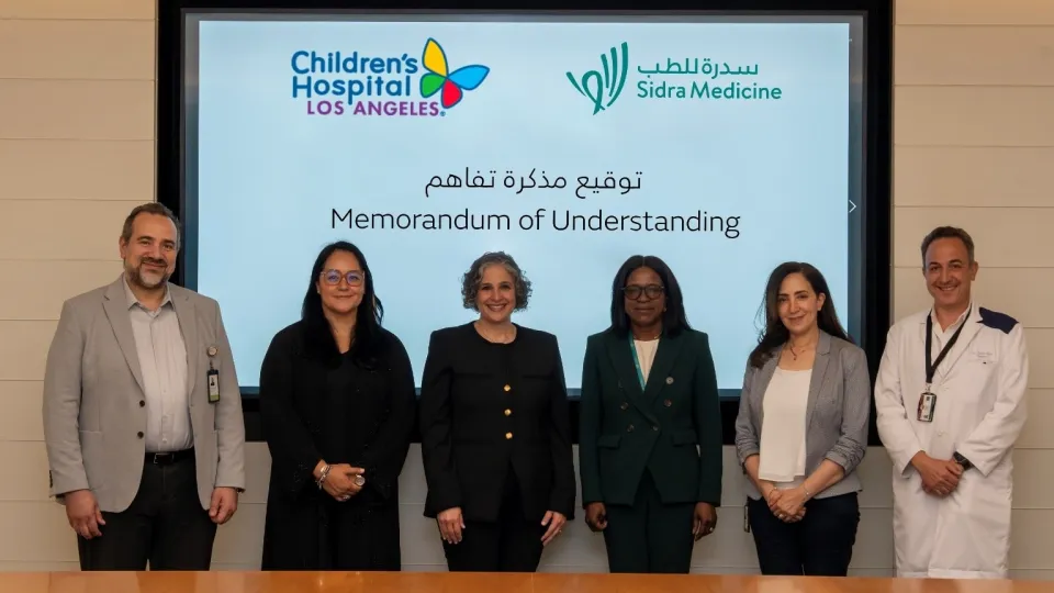 Children's Hospital Los Angeles and Sindra Medicine executives pose at memorandum of understanding ceremony