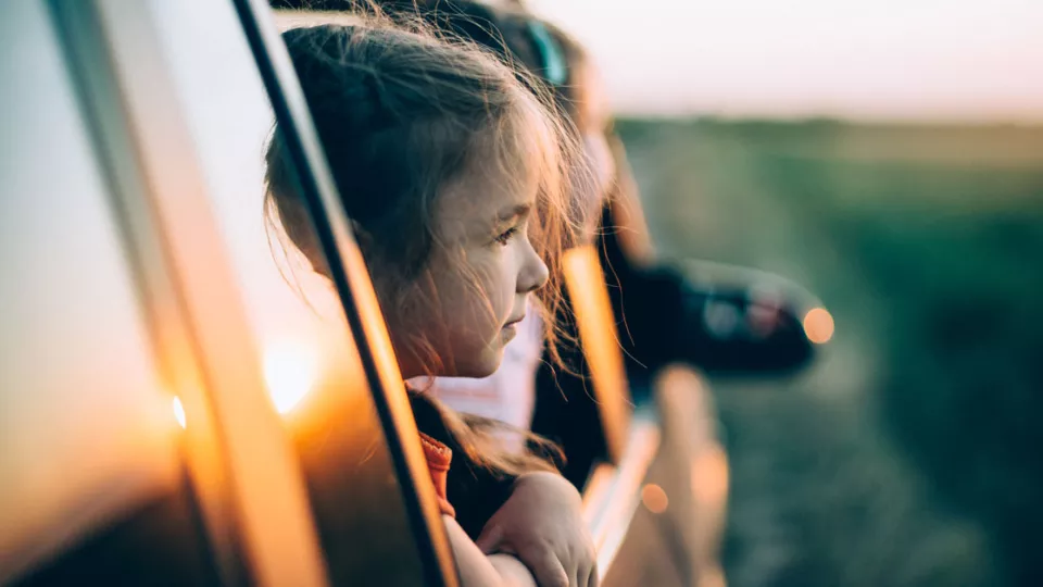 CHLA Blog - Motion Sickness - Girls looking out car window