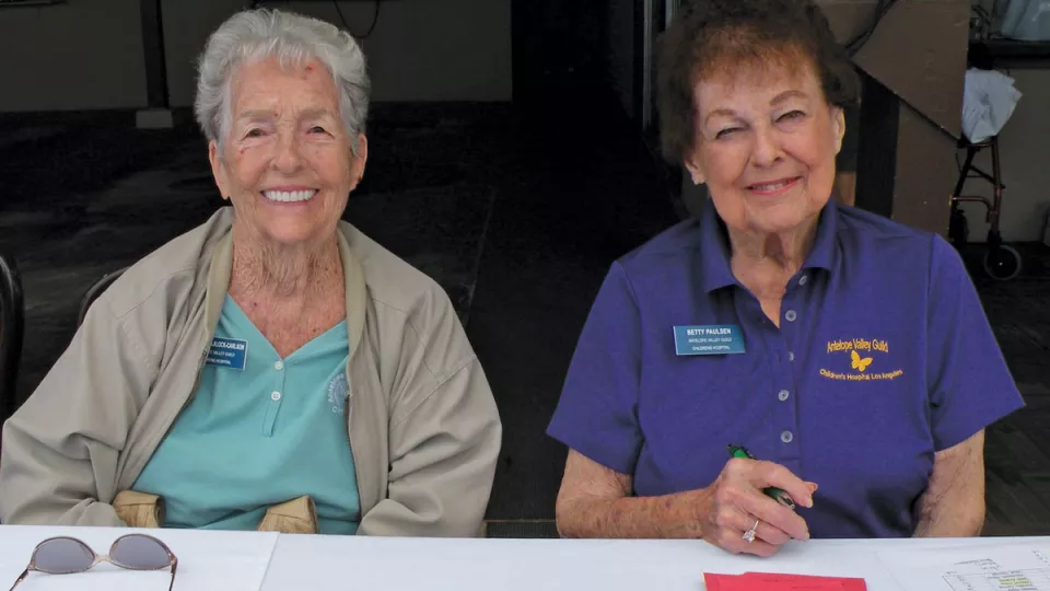 Charlene Blalock Carlson (left) and Betty Paulsen, members of the Antelope Valley Guild since 1963, at the Guild’s annual golf tournament