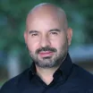 Professional headshot of Juan-Carlos Medina