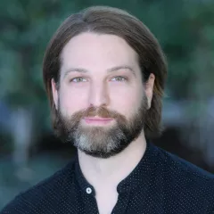 Professional headshot of Julian Cameron, MD