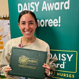 Liana Lorusso, RN poses with her DAISY Award