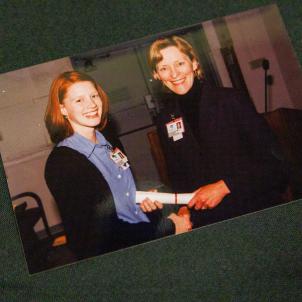 A photo from 1999 of Beth Zemetra, an RN Residency graduate, receiving her diploma.