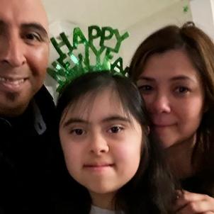 Amy with parents, after illness (Dec. 31, 2021)