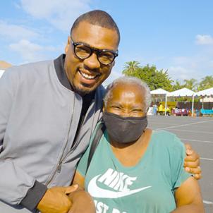 Rev. Dr. Shane B. Scott with an attendee