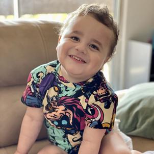 A smiling Oliver sports a Marvel tshirt following his kidney transplant