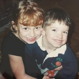 Sarah and her brother Manny as children