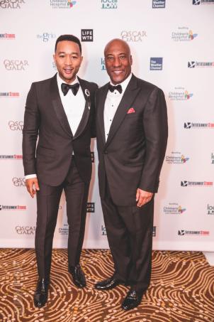 Singer John Legend, pictured with Byron Allen, treated guests to a special performance after the live auction.
