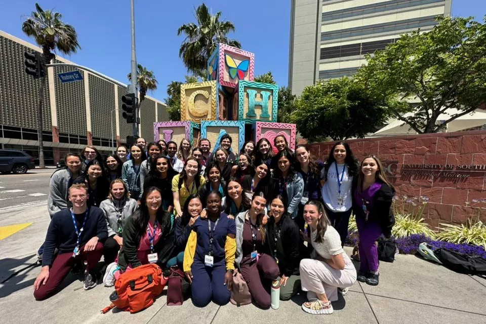 CHLA interns pose in front of Children's Hospital Los Angeles