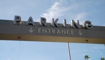 Sign that reads "Parking Entrance"