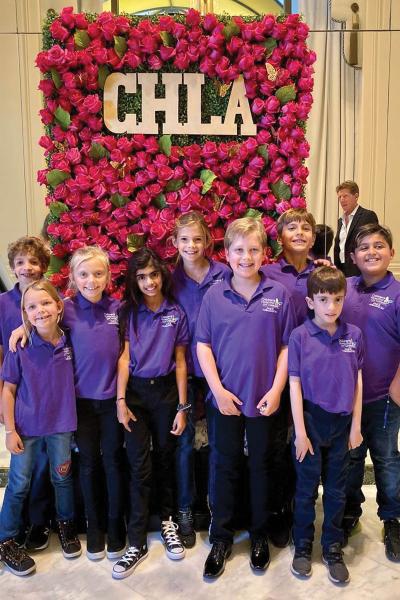 The annual Westside Guild Luncheon of Hope was decorated with flowers to match the event’s theme, “Where Hope Grows, Miracles Blossom.” Left to right: CHLA Junior Ambassadors Dylan and Madison Schumer, Shira Josephson, Saira Rahemtulla, Caroline Flei