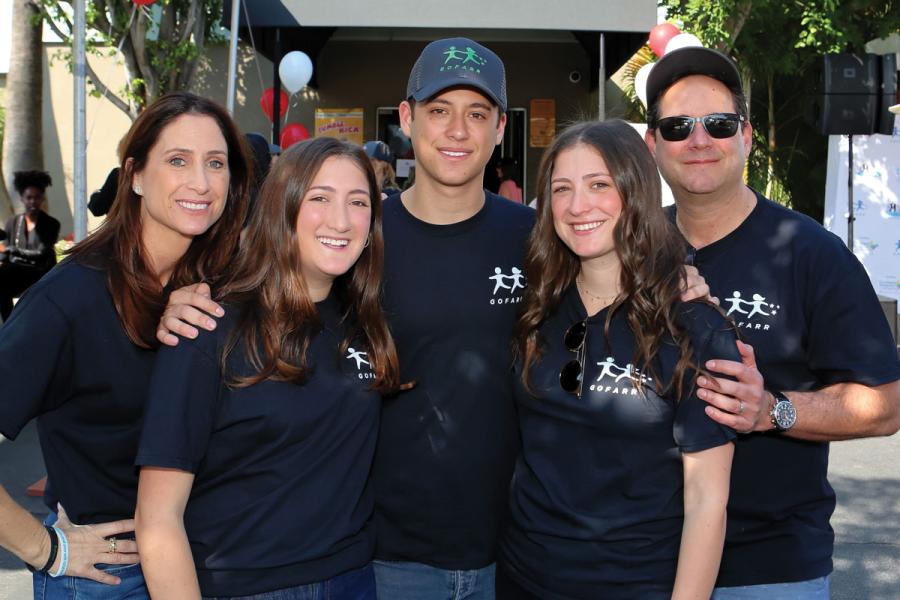 Elisa (left) and Michael Schenkman (far right), both members of the CHLA Foundation Board of Trustees, with their children, Amanda (second from left), Gabe and Shelby, at the Fifth Annual GOFARR Funfest on Nov. 11, 2018