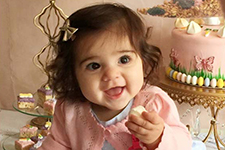 Baby Mila enjoys a sweet treat