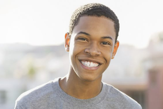 African American male teen smiling