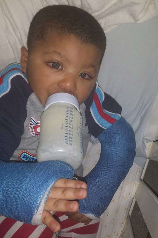 While recuperating from thumb surgery, Jordan insisted on holding his own bottle.