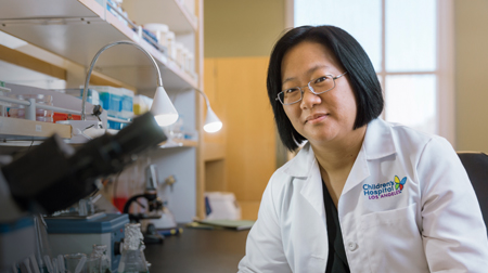 Research investigator Yong-Mi Kim, MD, PhD in her lab