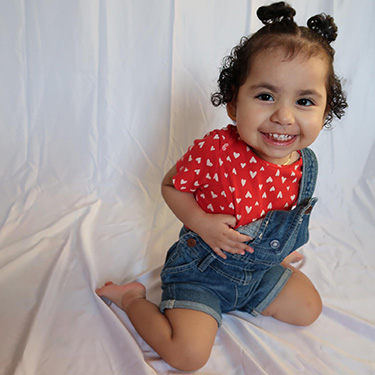 CHLA-genesis-hearts-375x375.jpg Smiling Toddler Genesis