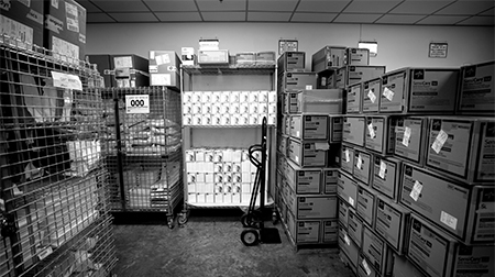 A storage room with COVID-19 test supplies and reagents