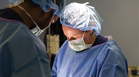 Tracy Grikscheit, MD, in the operating room