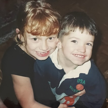 Sarah and her brother Manny as children